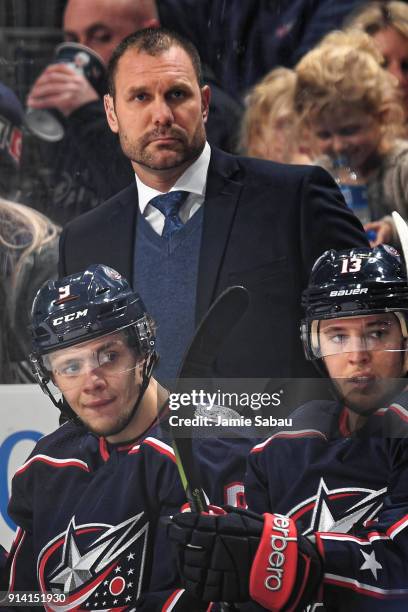 Assistant Coach Brad Larsen of the Columbus Blue Jackets watches his team play against the San Jose Sharks on February 2, 2018 at Nationwide Arena in...