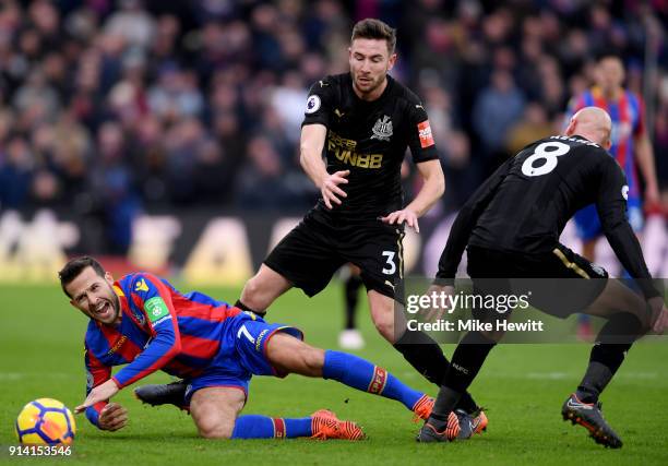 Yohan Cabaye of Crystal Palace is fouled by Paul Dummett of Newcastle United during the Premier League match between Crystal Palace and Newcastle...