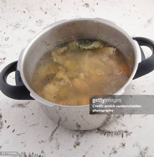 pressure-cooked fish broth. - pan face stock pictures, royalty-free photos & images
