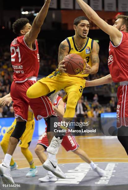 Augustine Rubit of Brose Bamberg, Peyton Siva of Alba Berlin and Dejan Musli of Brose Bamberg during the game between Alba Berlin and Brose Bamberg...