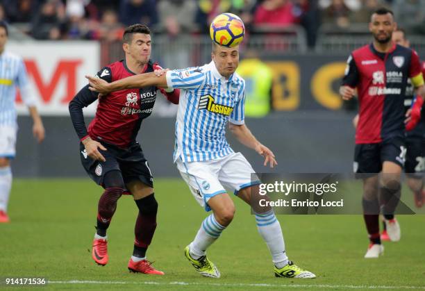 Contrast with Diego Farias of Cagliari and a player of Spal during the serie A match between Cagliari Calcio and Spal at Stadio Sant'Elia on February...