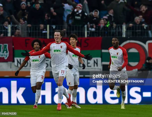 Augsburg's Austrian forward Michael Gregoritsch celebrates his goal during the German first division Bundesliga football match 1 FC Augsburg vs...