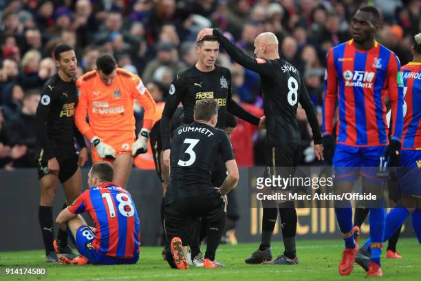 Congratulations from Jonjo Shelvey for Ciaran Clark after he makes 2 late blocks from James McArthur and Christian Benteke of Crystal Palace during...