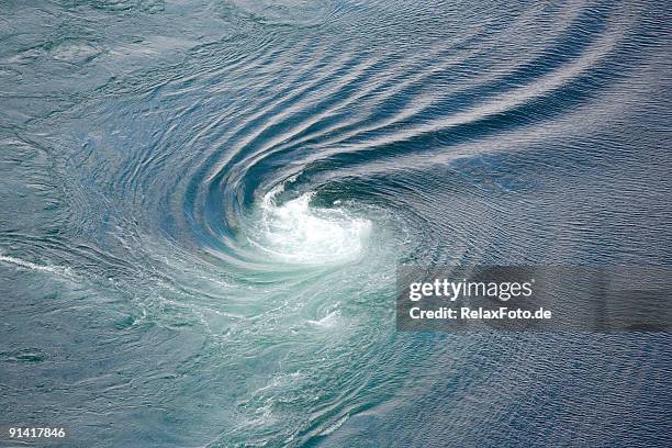 current tide at saltstraumen in norway (xxl) - spinning stock pictures, royalty-free photos & images