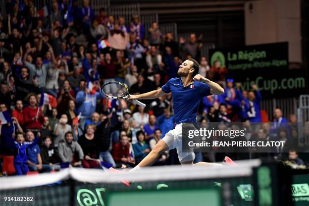 France's Adrian Mannarino reacts after winning his singles tennis match against the Netherlands' Robin Haase as part of the Davis Cup World Group...