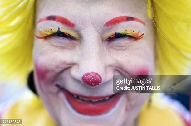 Clown poses for a photograph ahead of the annual Grimaldi Memorial Service at the All Saints church in east London on February 4, 2018. The service...