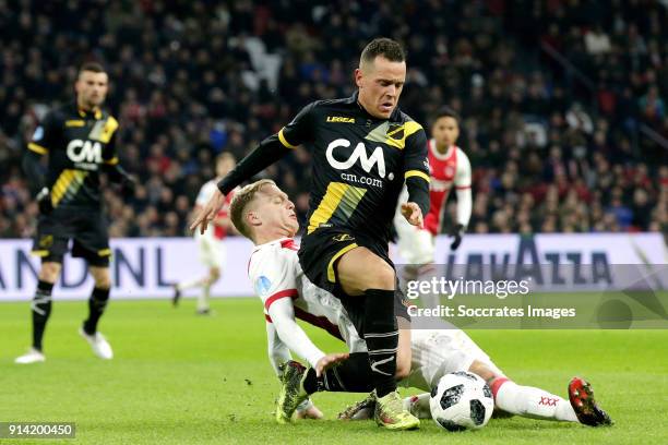 Donny van de Beek of Ajax, Giovanni Korte of NAC Breda during the Dutch Eredivisie match between Ajax v NAC Breda at the Johan Cruijff Arena on...