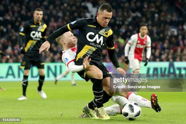 Donny van de Beek of Ajax, Giovanni Korte of NAC Breda during the Dutch Eredivisie match between Ajax v NAC Breda at the Johan Cruijff Arena on...