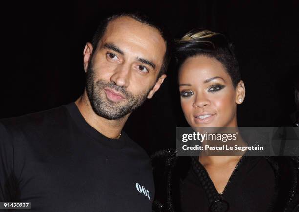 Designer Ricardo Tisci and Rihanna pose backstage during the Givenchy Pret a Porter show as part of the Paris Womenswear Fashion Week Spring/Summer...
