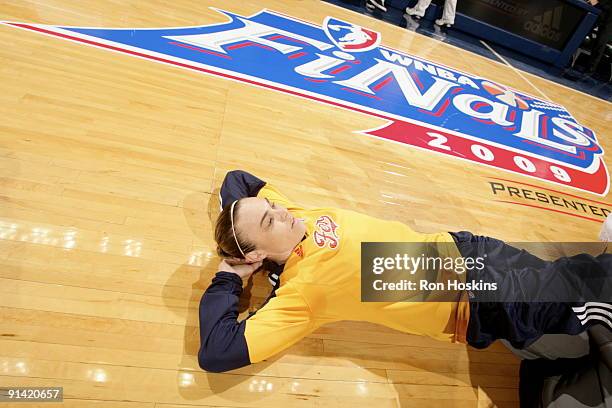 Tully Bevilaqua of the Indiana Fever stretches prior to Game Three of the WNBA Finals on October 4, 2009 at Conseco Fieldhouse in Indianapolis,...