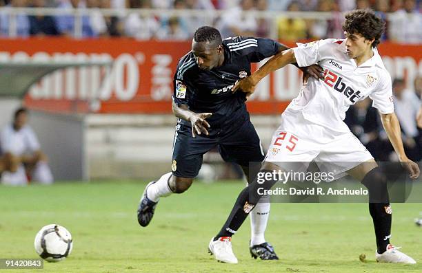 Mahamadou Diarra of Real Madrid fights for the ball during the La Liga match between Sevilla and Real Madrid at Estadio Ramon Sanchez Pizjuan on...