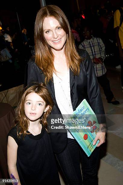 Actress Julianne Moore and her daughter Liv Freundlich attend Make It Matter Day in support of literacy and education at The New York Public Library...
