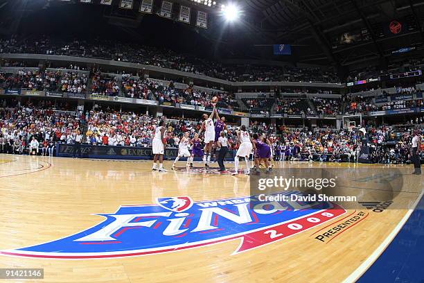 Tangela Smith of the Phoenix Mercury jumps ball against Tammy Sutton-Brown of the Indiana Fever in Game Three of the WNBA Finals on October 4, 2009...