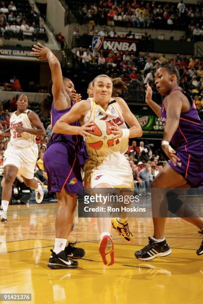Tully Bevilaqua of the Indiana Fever looks to shoot against Temecka Johnson of the Phoenix Mercury in Game Three of the WNBA Finals on October 4,...