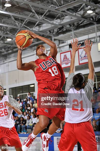 Renee Montgomery shoots over Lindsey Harding the Women's USA Basketball team during the National Team Fall Training Camp on October 4, 2009 at the...