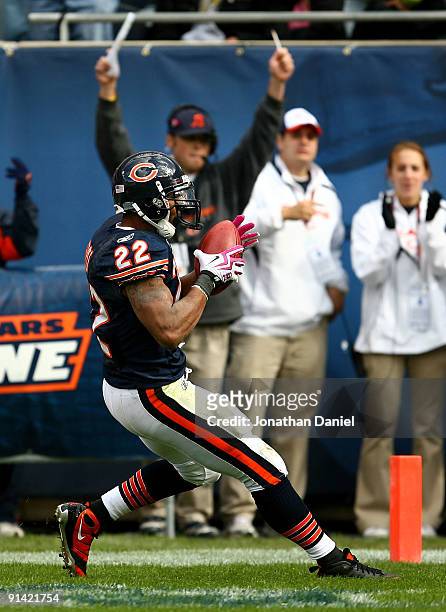 Matt Forte of the Chicago Bears scores a touchdown against the Detroit Lions on October 4, 2009 at Soldier Field in Chicago, Illinois. The Bears...