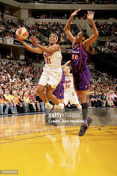 Tamecka Dixon of the Indiana Fever looks to shoot against Tangela Smith of the Phoenix Mercury in Game Three of the WNBA Finals on October 4, 2009 at...