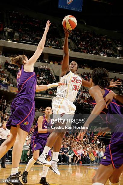 Ebony Hoffman of the Indiana Fever shoots against Nicole Ohlde of the Phoenix Mercury in Game Three of the WNBA Finals on October 4, 2009 at Conseco...