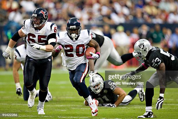 Steve Slaton of the Houston Texans runs with the ball against the Oakland Raiders at Reliant Stadium on October 4, 2009 in Houston, Texas. The Texans...