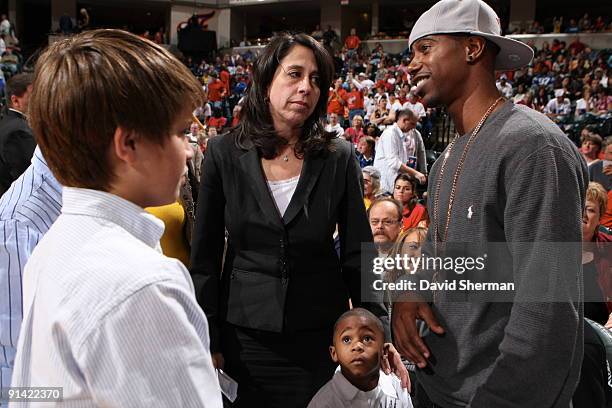 President Donna Orender speaks to T.J. Ford of the Indiana Pacers during the game of the Indiana Fever against the Phoenix Mercury in Game Three of...