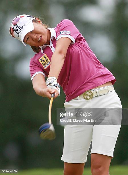 Ji Young Oh of South Korea watches her drive on the 11th tee during final round play in the Navistar LPGA Classic at the Robert Trent Jones Golf...