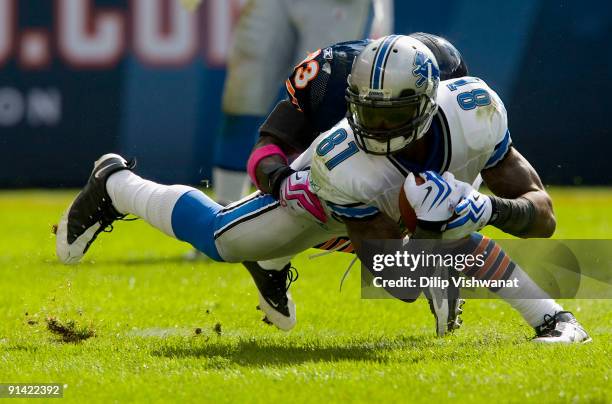 Calvin Johnson of the Detroit Lions catches a pass against the Chicago Bears at Soldier Field on October 4, 2009 in Chicago, Illinois. The Bears beat...