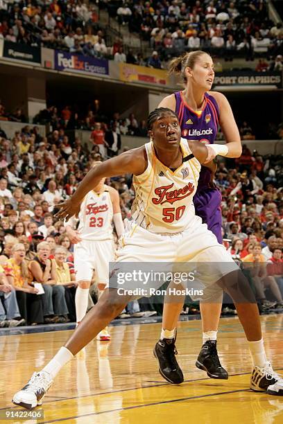 Jessica Davenport of the Indiana Fever boxes out against Nicole Ohlde of the Phoenix Mercury in Game Three of the WNBA Finals on October 4, 2009 at...
