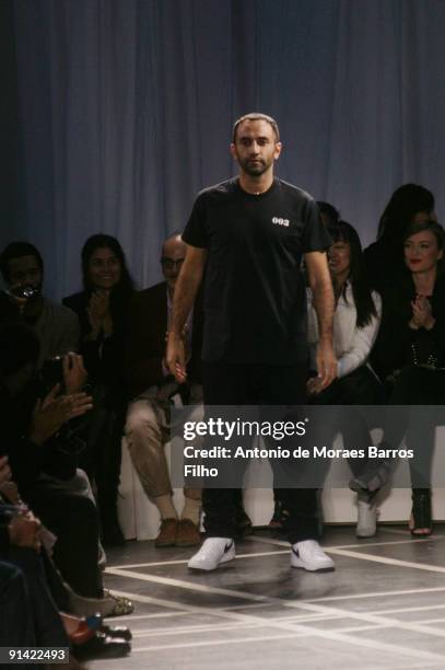 Designer Riccardo Tisci walks the runway at the GivenchyPret-a-Porter show during Paris Womenswear Fashion Week Spring/Summer 2010 on October 4, 2009...