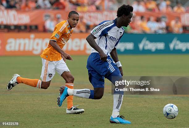 Ricardo Clarke of the Houston Dynamo chases Kei Kamara of the Kansas City Wizards on October 4, 2009 at Robertson Stadium in Houston, Texas.