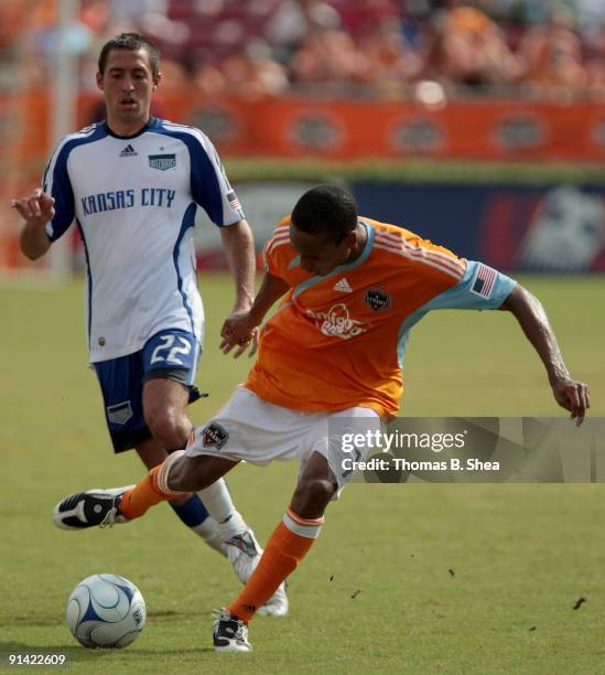 Ricardo Clark of the Houston Dynamo chases Kei Kamara of the Kansas City Wizards on October 4, 2009 at Robertson Stadium in Houston, Texas.