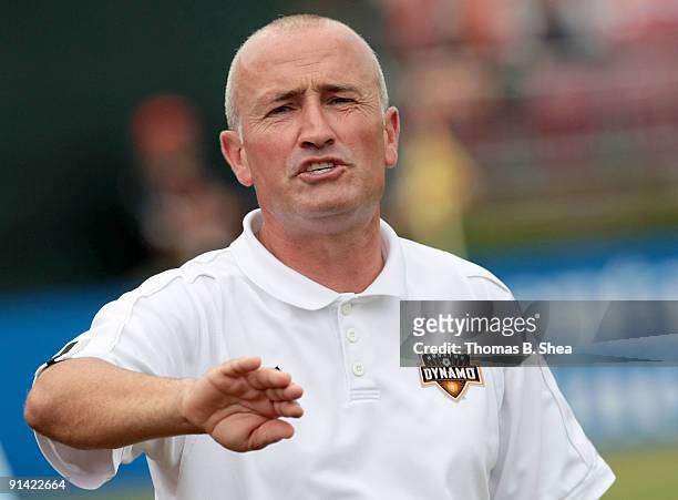 Head coach Dominic Kinnear of the Houston Dynamo yells at referee Jorge Gonzalez while the Dynamo play against the Kansas City Wizards on October 4,...