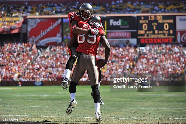 Antonio Bryant of the Tampa Bay Buccaneers celebrates his touchdown against the Washington Redskins at FedExField on October 4, 2009 in Landover,...