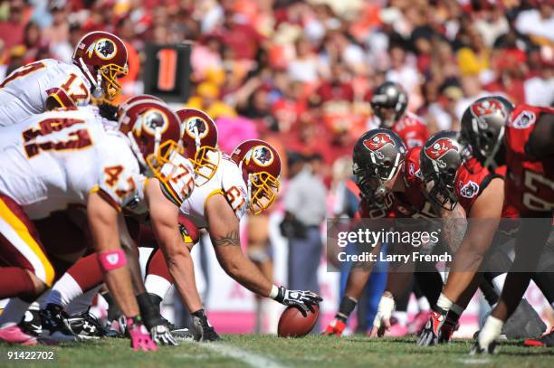 Casey Rabach of the Washington Redskins snaps the ball during the game against the Tampa Bay Buccaneers at FedExField on October 4, 2009 in Landover,...