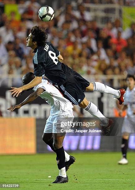 Kaka of Real Madrid duels for a high ball with Didier Zokora of Sevilla during the La Liga match between Sevilla and Real Madrid at the Estadio Ramon...