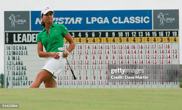 Lorena Ochoa of Mexico watches her putt on the 18th green during the final round of the Navistar LPGA Classic at the Robert Trent Jones Golf Trail at...