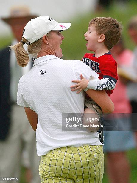 Janice Moodie of Scotland is greeted by her son Craig following her final round play in the Navistar LPGA Classic at the Robert Trent Jones Golf...