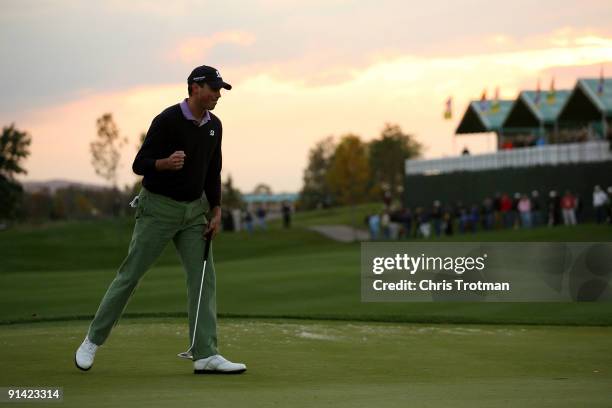 Matt Kuchar holes his birdie putt on the 18th green during the play off to tie Vaughn Taylor at the 2009 Turning Stone Resort Championship at...