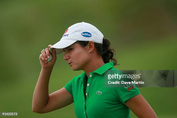 Lorena Ochoa of Mexico tips her cap on the 12th hole during final round play in the Navistar LPGA Classic at the Robert Trent Jones Golf Trail at...