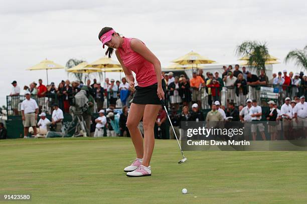 Sandra Gal of Germany watchesher putt fall in the cup on the 18th hole during final round play in the Navistar LPGA Classic at the Robert Trent Jones...