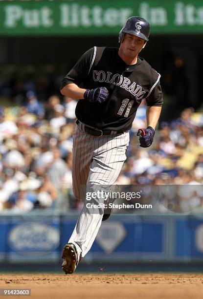 Brad Hawpe of the Colorado Rockies circles the bases after hitting a home run in the second inning against the Los Angeles Dodgers on October 4, 2009...