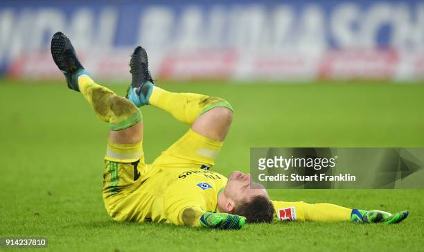 Christian Mathenia of Hamburg reacts during the Bundesliga match between Hamburger SV and Hannover 96 at Volksparkstadion on February 4, 2018 in...