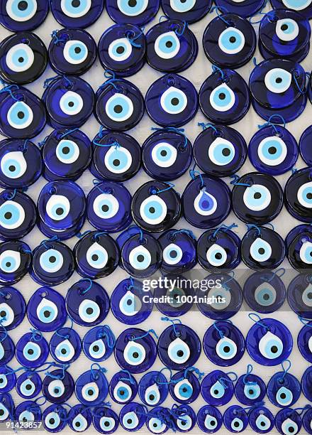 evil eye bead nazar boncugu - pendant stock pictures, royalty-free photos & images