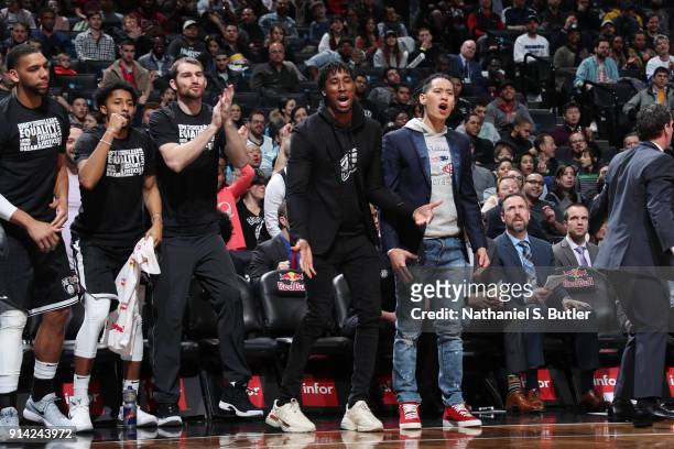 Rondae Hollis-Jefferson and Jeremy Lin of the Brooklyn Nets react to a play from courtside during the game against the Milwaukee Bucks on February 4,...