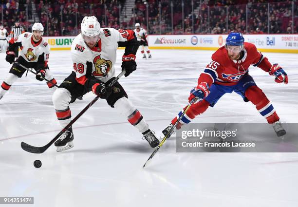 Christopher DiDomenico of the Ottawa Senators controls the puck while being challenged by Joe Morrow of the Montreal Canadiens in the NHL game at the...