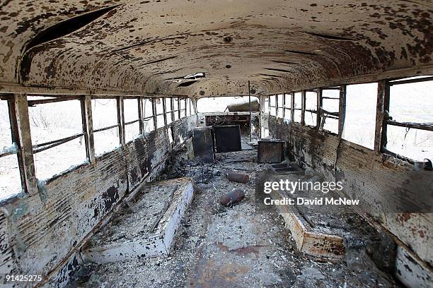 Burned up bus is left behind by the 3,500-acre Sheep fire as it advances toward the evacuated mountain town of Wrightwood on October 4, 2009 in...