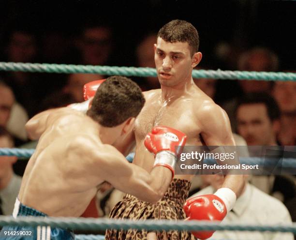 Prince Naseem Hamed of Great Britain in action against Sergio Rafael Liendo of Argentina at The Forum in Livingston, Scotland on 4th March 1995....