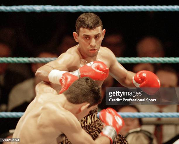 Prince Naseem Hamed of Great Britain in action against Sergio Rafael Liendo of Argentina at The Forum in Livingston, Scotland on 4th March 1995....