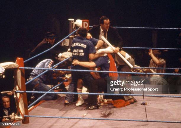 Mayhem during the WBA and WBC World middleweight title fight between Alan Minter of Great Britain and Marvin Hagler of the USA after a spectator...