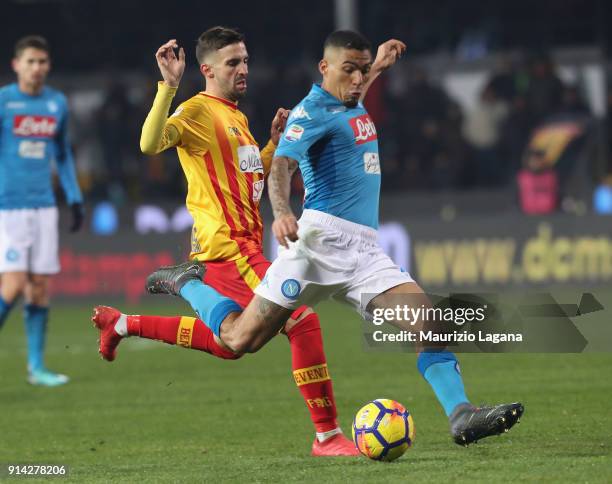 Marco D'Alessandro of Benevento competes for the ball with Allan of Napoli during the serie A match between Benevento Calcio and SSC Napoli at Stadio...
