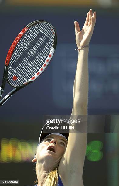 Daniela Hantuchova of Slovakia serves to Carla Suarez Navarro of Spain during their match of the China Open at the National Tennis Center in Beijing...